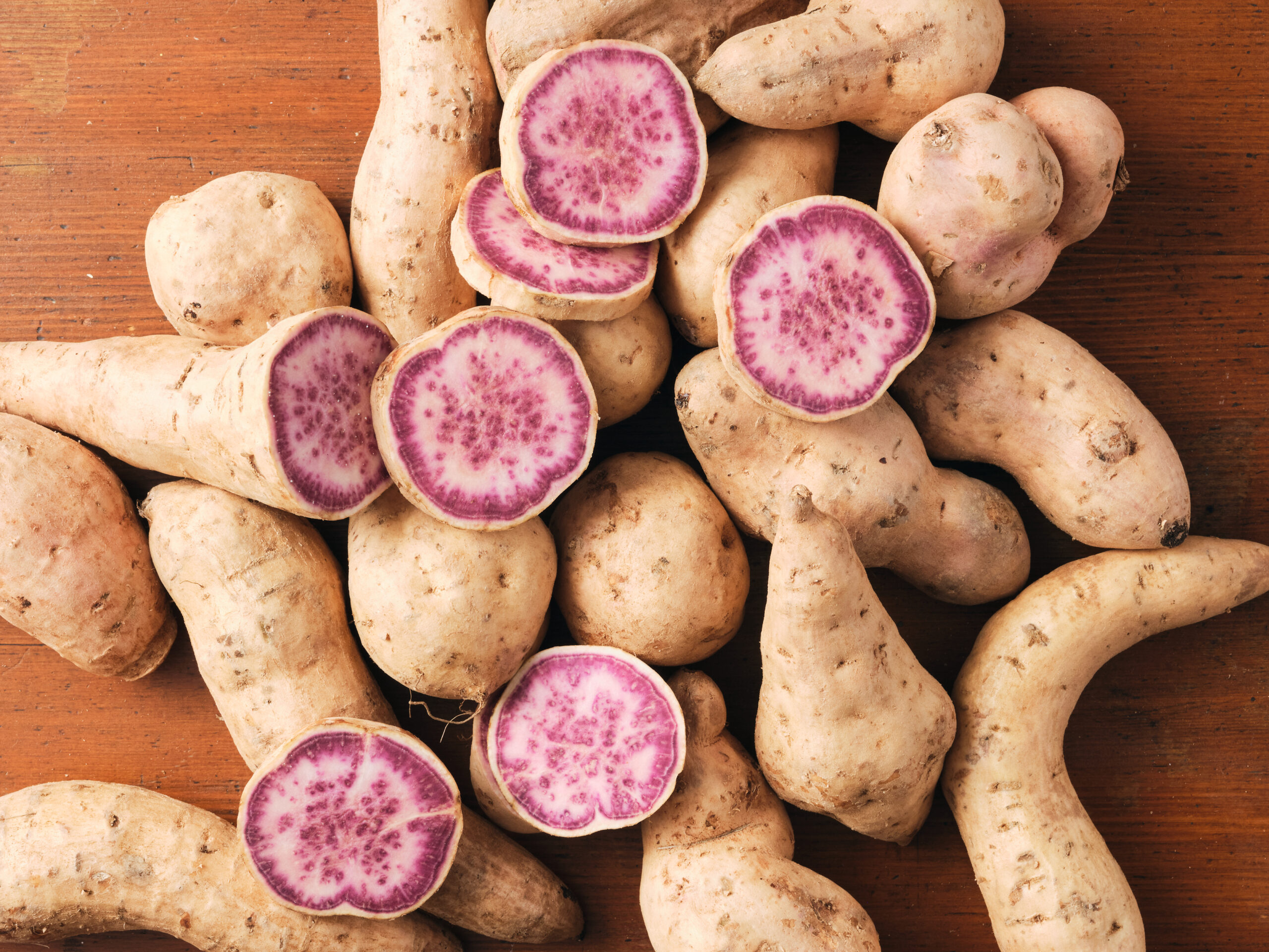 okinawan sweet potatoes sliced in half