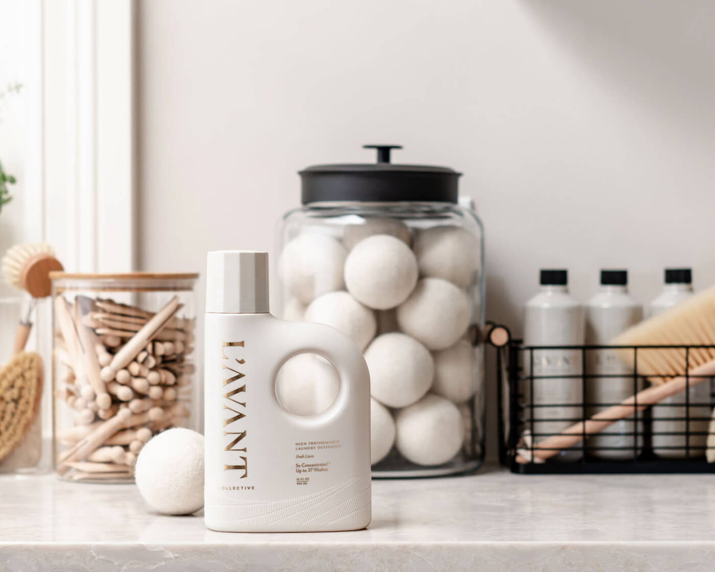 L'Avant  Collective product with jar of balls and wooden sticks